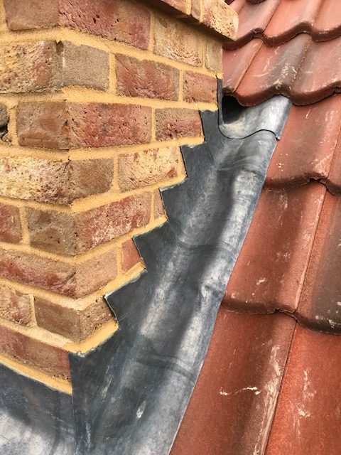 Leadwork on chimney and roof by roofers in Norwich